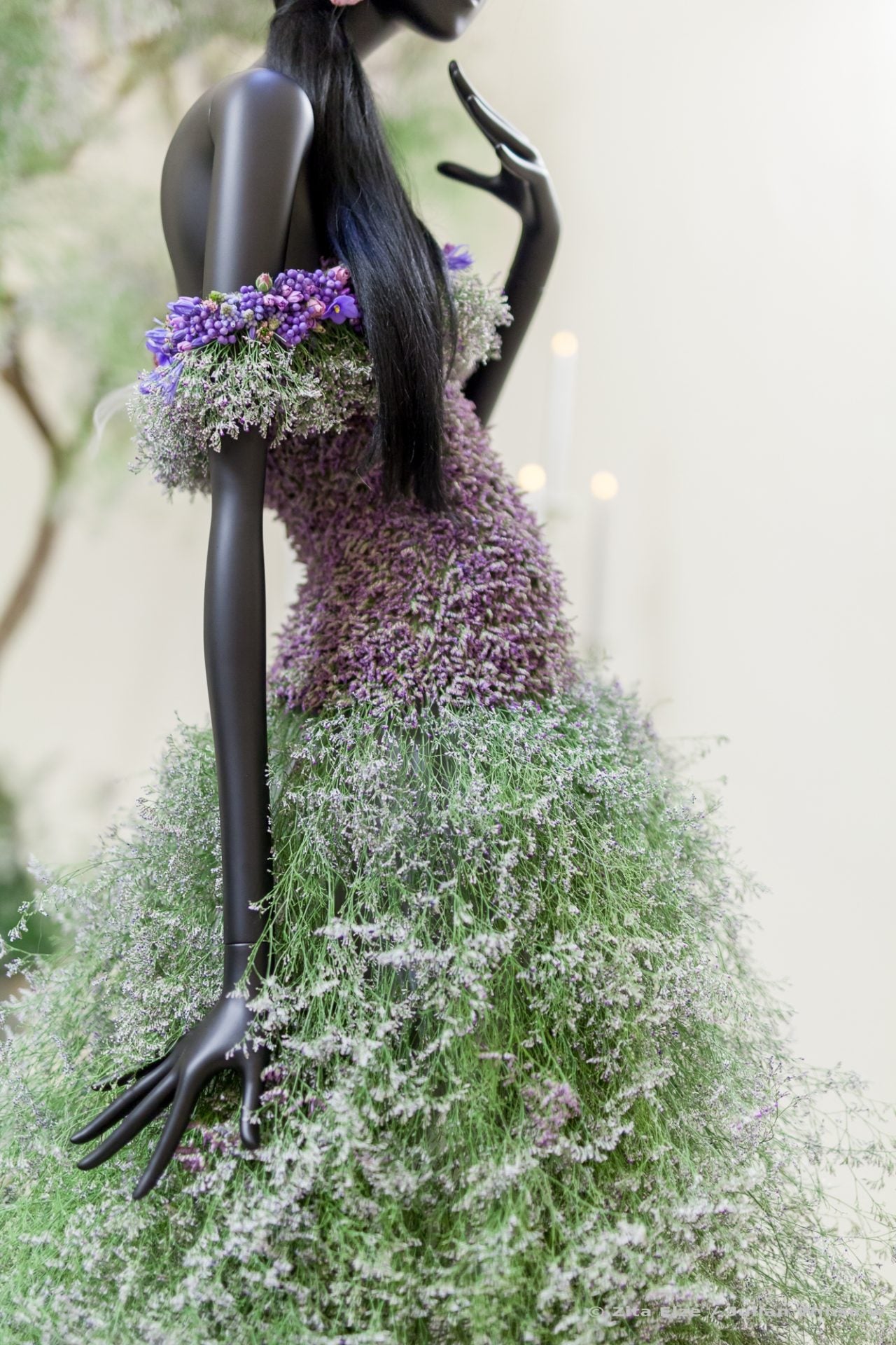 Dress made with Flower embroidery on a black mannequin