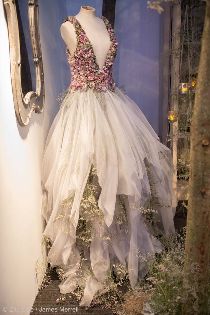 gown with the top adorned with pink flowers