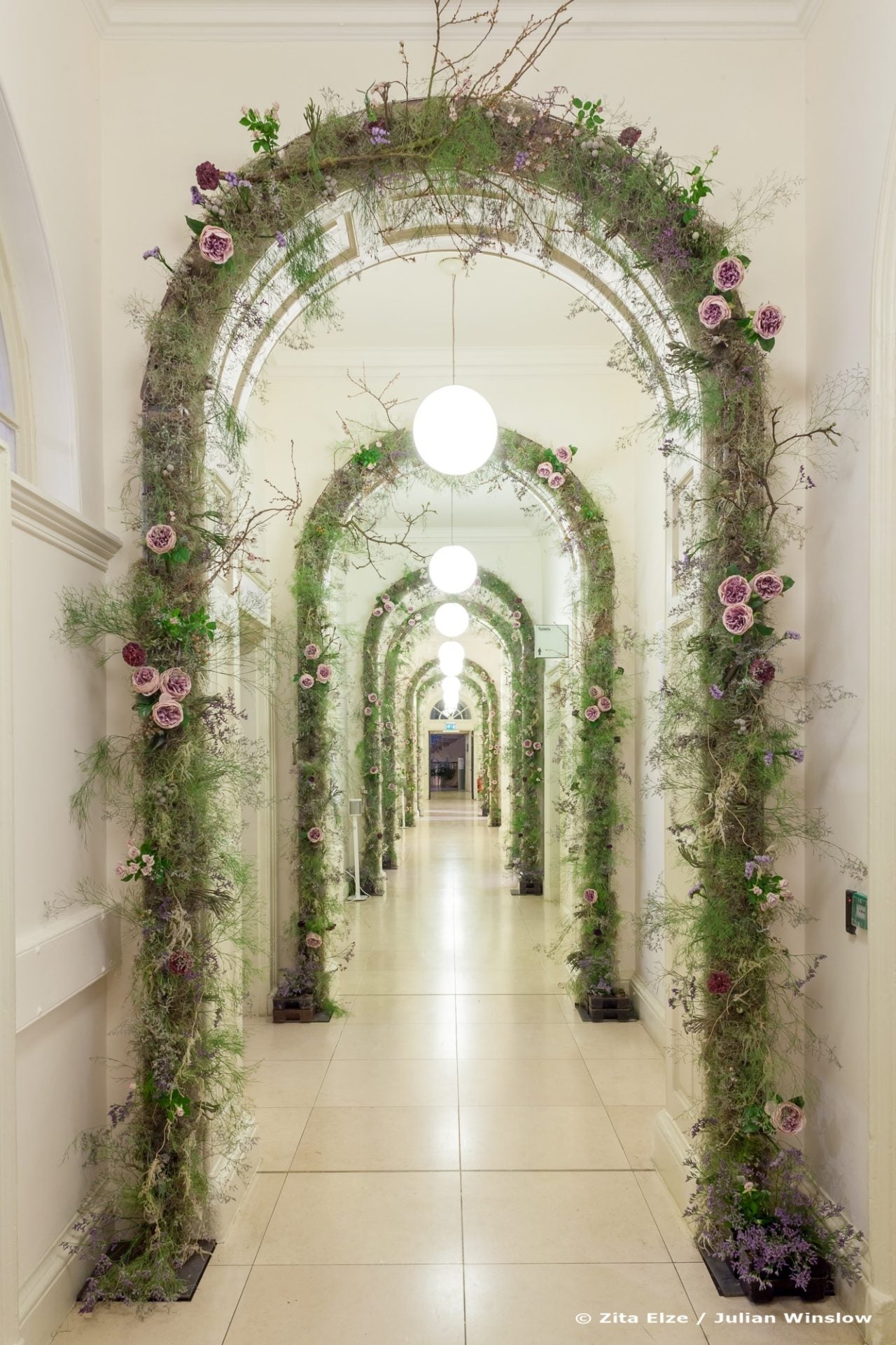 arch gallery decorated with flowers