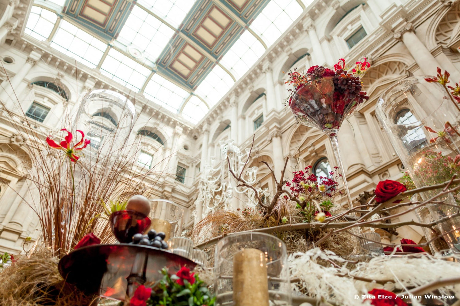 elegant ancient building photographed from the floor with flower arrangements