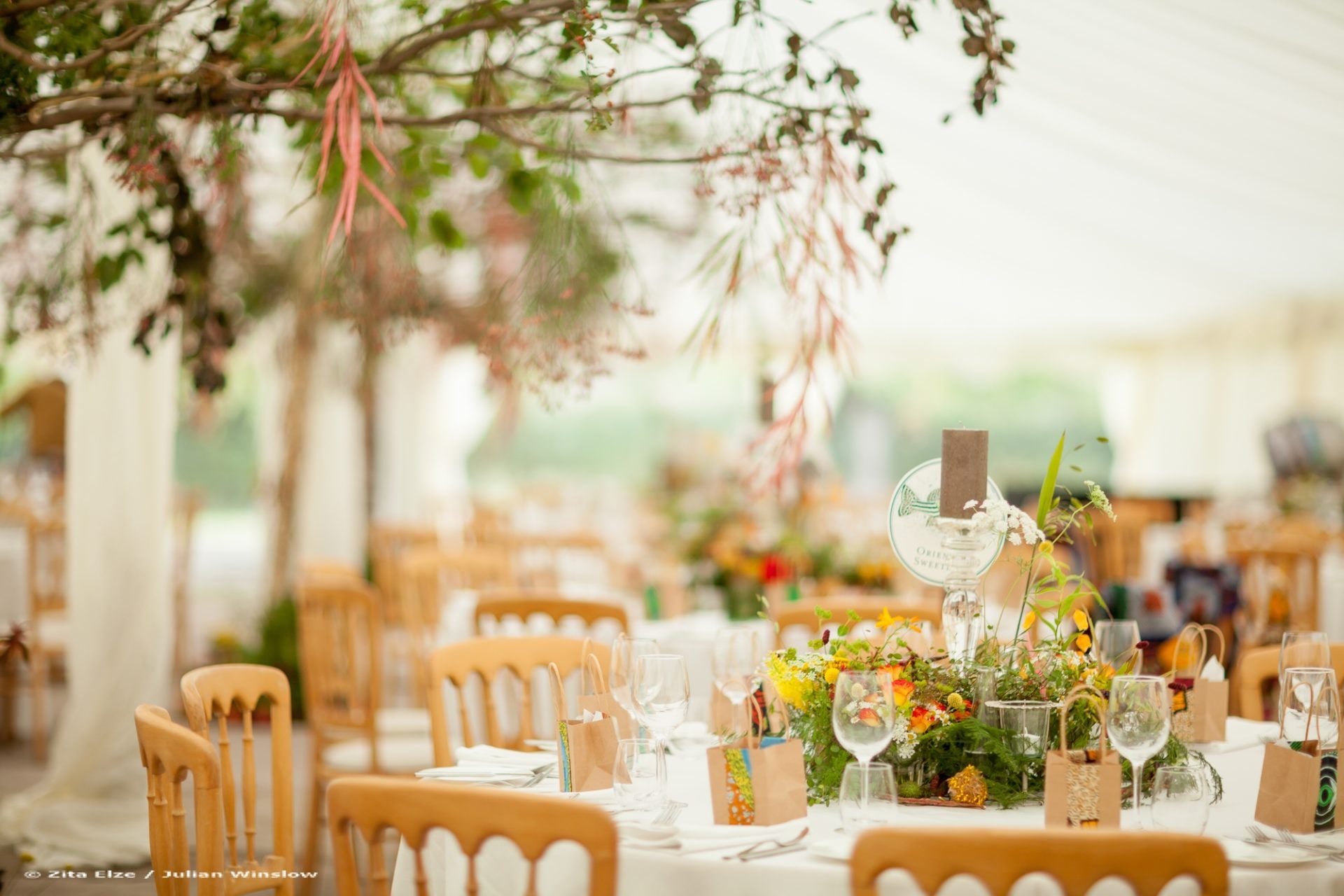 Wedding table with chairs and a flower centrepiece